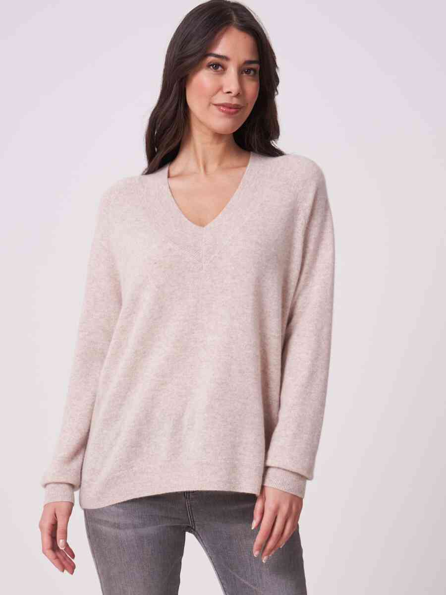 Organic cashmere sweater with deep ribbed V-neckline