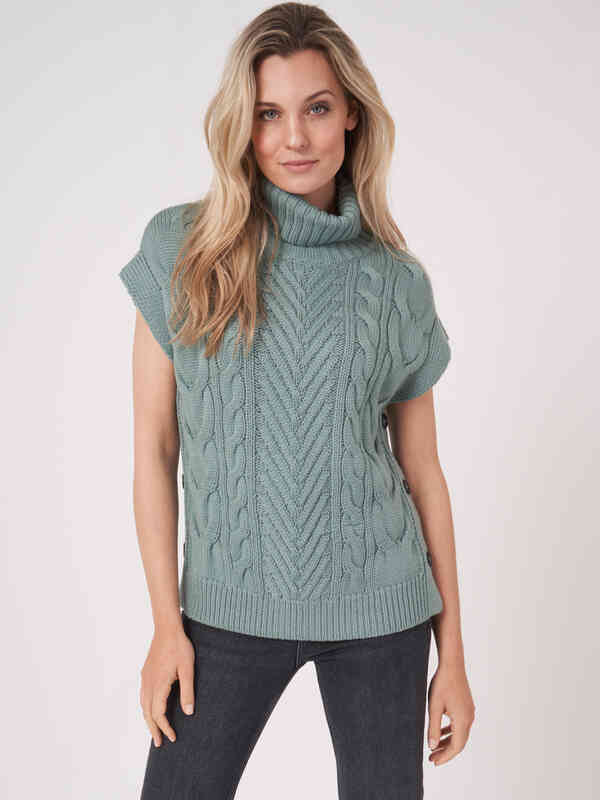Chunky cable knit sleeveless poncho