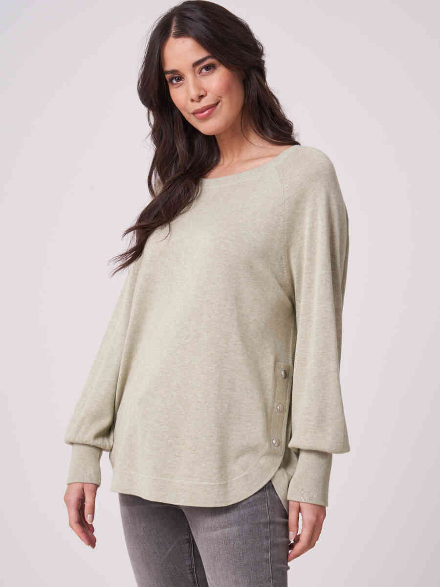 Cotton blend sweater with side buttons and round hem