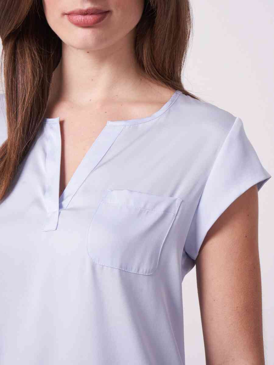 Top with chest pocket