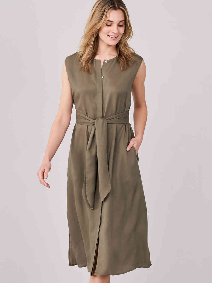 Sleeveless dress with concealed button placket and tie waist