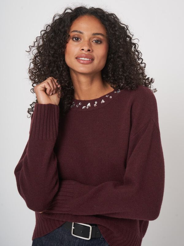 Oversized knit sweater with rhinestone detail